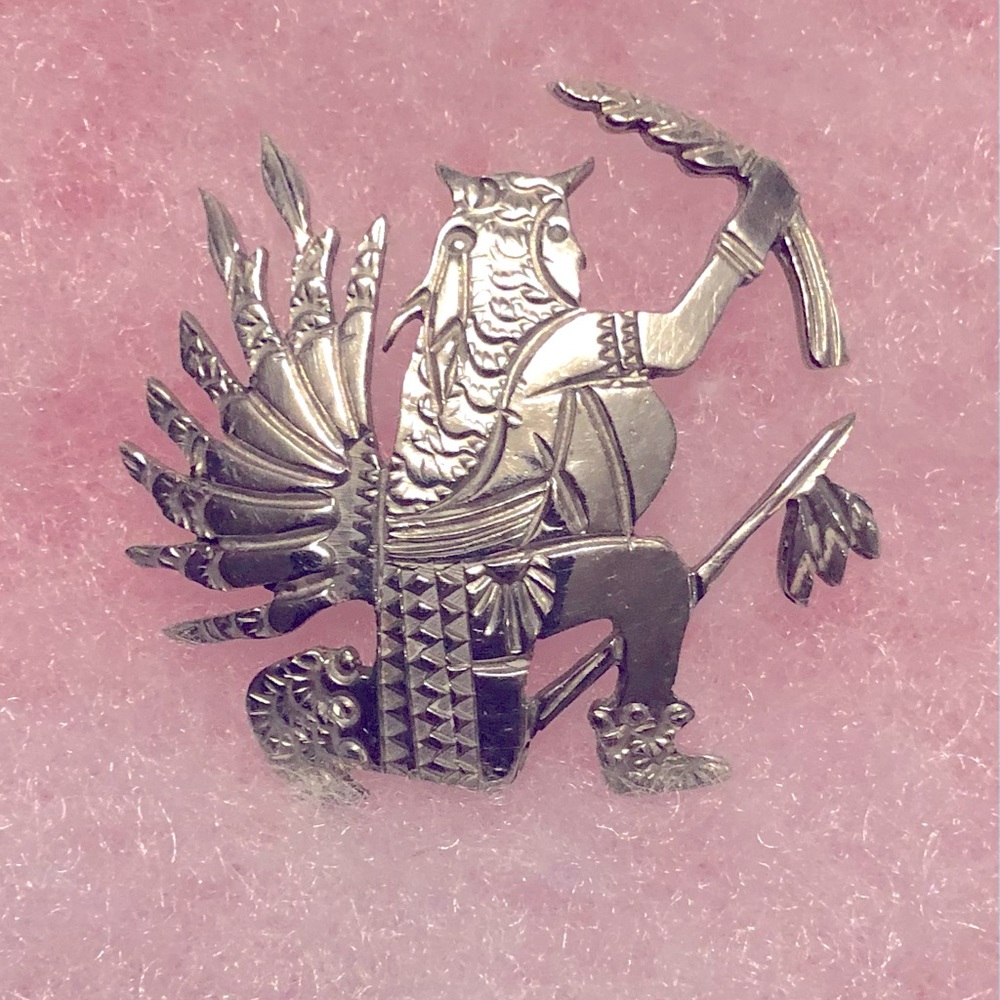 Sterling silver brooch or lap pin.